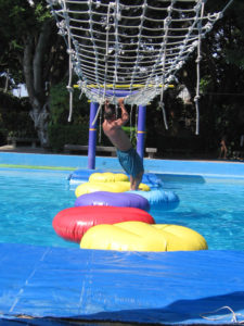 Lilly pads are just as fun to fall off of as to stay afloat on in Ex-Hacienda Temixco in Morelos, Mexico. © Julia Taylor 2008