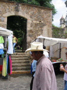 Visitors arrive early at the Sunday craft market where merchants have already set up their stands. © Julia Taylor 2007
