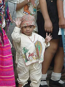 Little boy in a tilmaPhoto Rivas ©