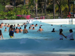The extensive wave pool creates huge waves that will lift you right off your feet. This is one of the most popular waterpark atractions in Mexico. © Julia Taylor 2008