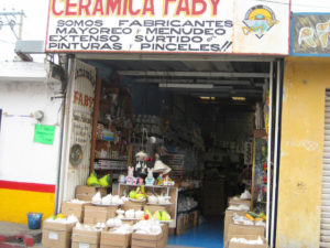 Another ceramics shop in 3 de Mayo offers finished ceramics as well as bisque, paints and brushes. The sign over the door states "Somos Fabricantes," meaning you are buying directly from the Mexican craftspeople. © Julia Taylor, 2008