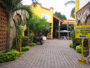 Plaza de la Rosa in 3 de Mayo offers more Mexican arts and crafts shops as well as an enticing outdoor restaurant with tables beneath parasols. © Julia Taylor, 2008