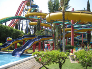 Surrounded by well tended lawns, slides of all sizes and daring and loop-de-loops invite swimmers of all ages to enjoy the fun under Mexico's sun in El Rollo, not far from Cuernavaca. © Julia Taylor, 2008