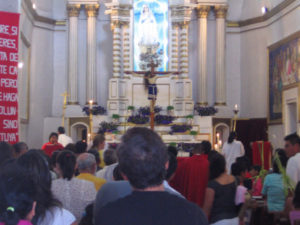 Sunday mass in Santa Maria. The virgin over the altar is the patron saint of the town. © Julia Taylor, 2007