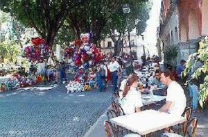 Sidewalk cafes on the plaza Photo by Alan Cogan