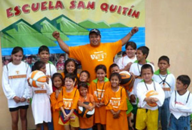 Jose Alonso Reynoso Meza with children from th San Quintin school in Nayarit © Edd Bissell, 2011