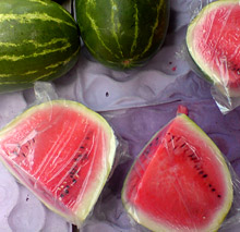 Succulent watermelon tempts shoppers in a Mexican tianguis, or traveling street market. © Daniel Wheeler, 2009