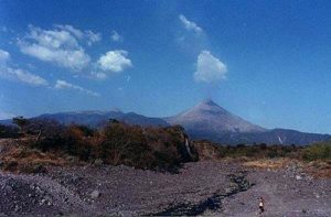 Vulcan de Fuego steams above the Colima countryside.