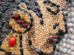 Natural seeds were patiently placed one by one to created these amazing mosaic images on Tepoztlan's seed archway. © Julia Taylor 2007