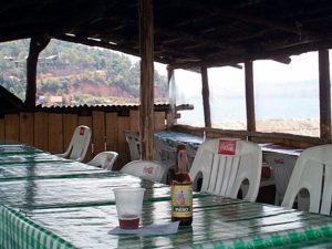 The restaurant at the end of the dock affords this skybox seat to catch the cool lake breezes as you sip your beverage while waiting for your boat. The road up the hill goes to Santa Clara.