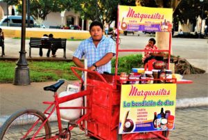In the center of town, vendors like this man sell local favorites. © 2020 Jane Ammeson