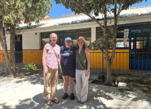 Noël, Naomi and Dorian - standing where our grandmother was photographed with a student named Martha more that 30 years earlier). © 2022 Noel Carmichael.