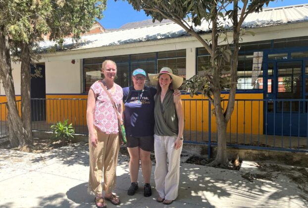 Noël, Naomi and Dorian - standing where our grandmother was photographed with a student named Martha more that 30 years earlier). © 2022 Noel Carmichael.