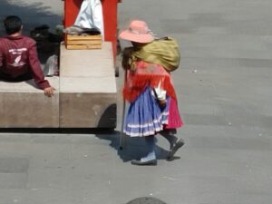 Mazahua woman crossing main plaza in Atlacomulco de Fabela, Mexico State - Una mujer mazahua cruzando la plaza principal en Atlacomulco de Fabela, el Estado de México © 2021 James Musselman