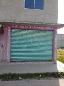 Storefront in San Felipe del Progreso (UIEM), partially in Mazahua - Una fachada en San Felipe del Progreso (la UIEM), parcialmente en mazahua © 2021 James Musselman