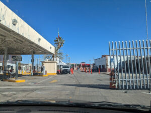 Border Crossing, Sonoyta, Mexico (foreground) to Lukeville, Arizona, (background) © 2023 Allan Wall.
